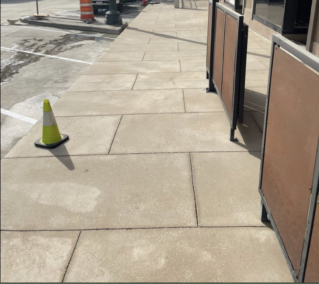 here is a picture of a mobile sandblasting job of concrete sidewalks and walkways in houston